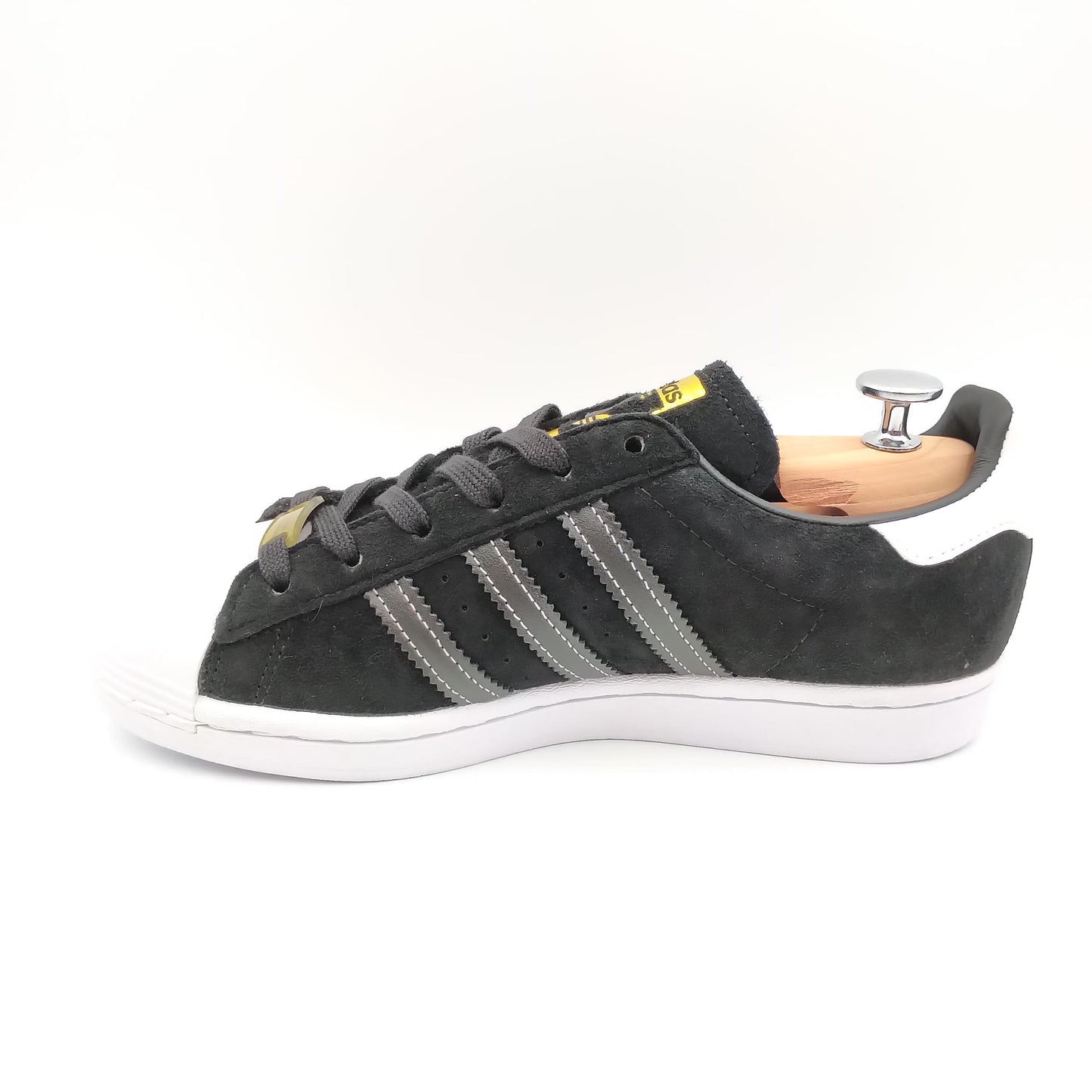 Adidas Superstar noir avec bandes grises