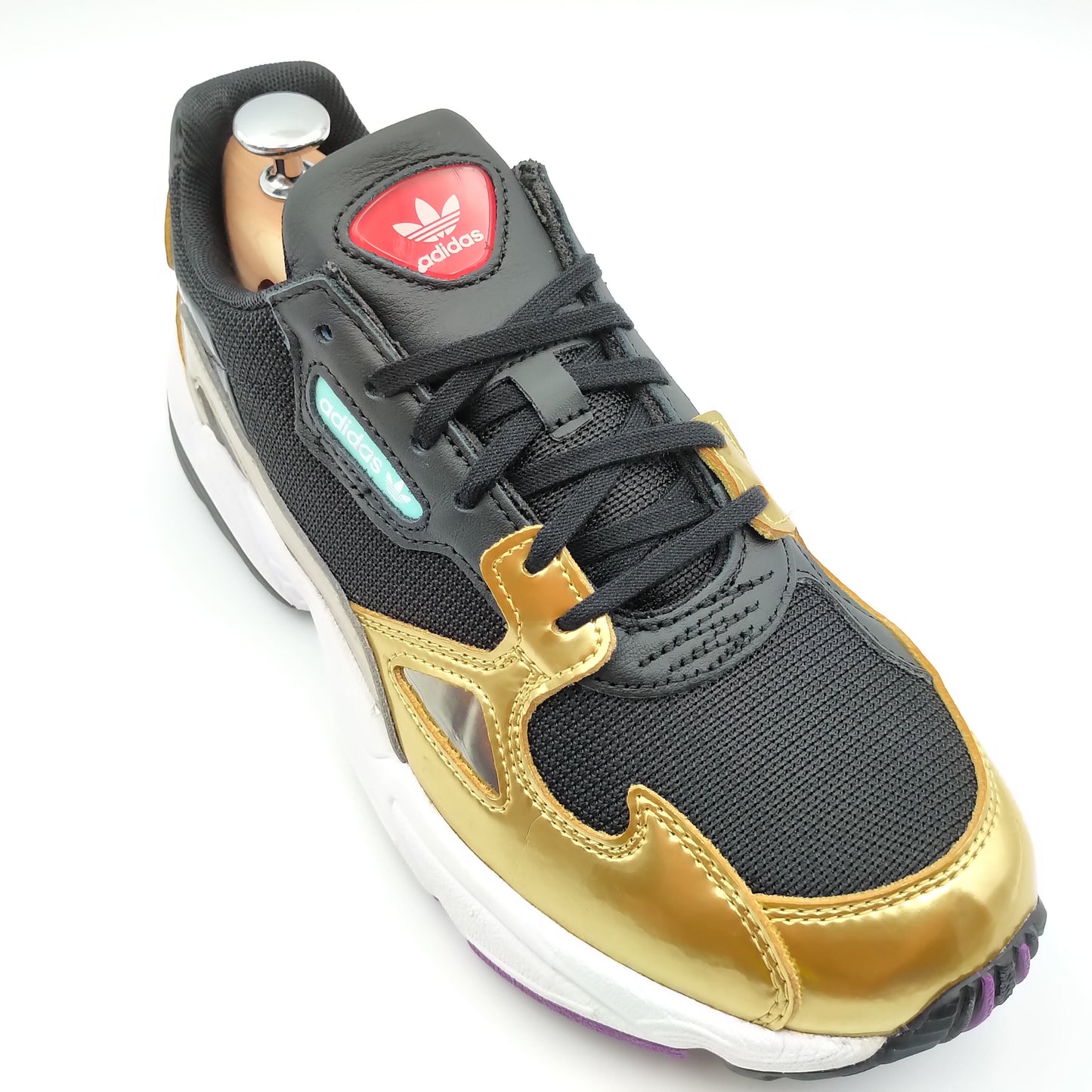 Adidas Falcon noir et doré avec logo rouge