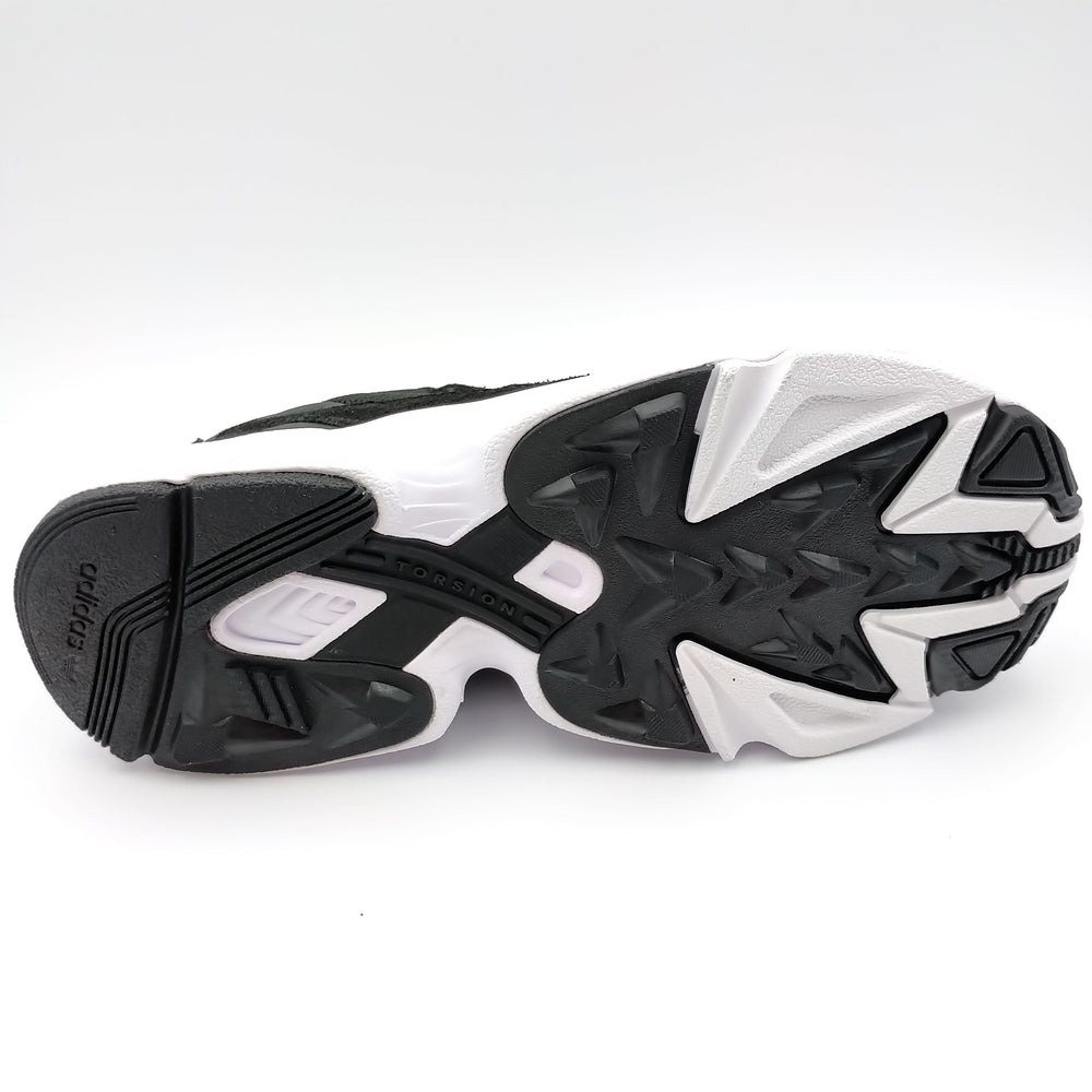 Adidas Falcon noir avec motifs dorés