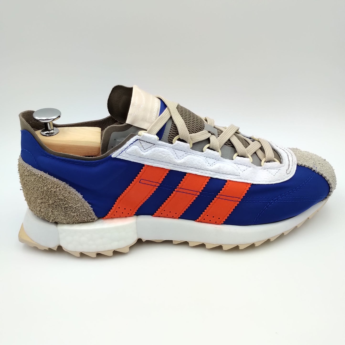 Adidas SL7600 bleu et grise avec bandes rouges
