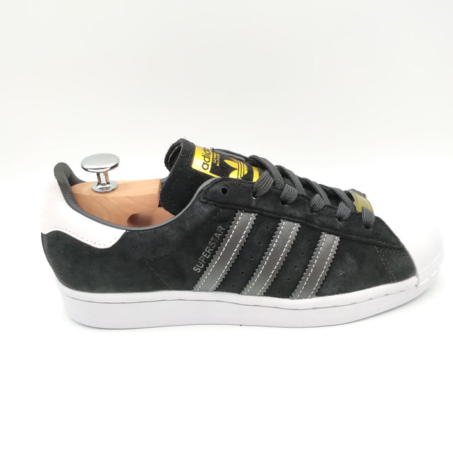 Adidas Superstar noir avec bandes grises