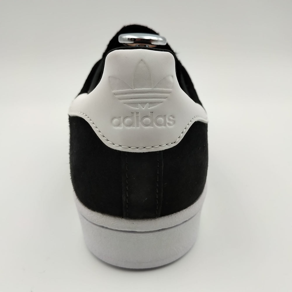 Adidas Superstar noir avec bandes grises