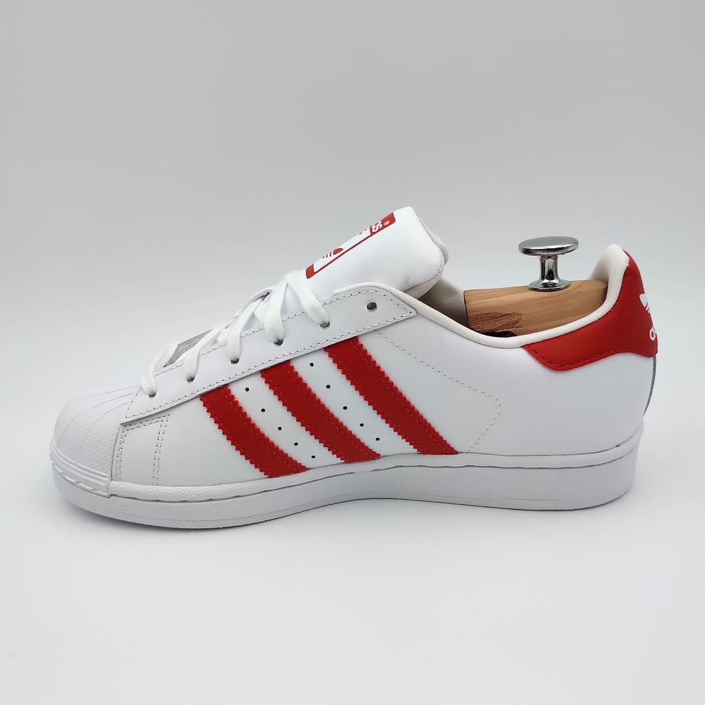 Adidas Superstar blanches avec bandes rouges