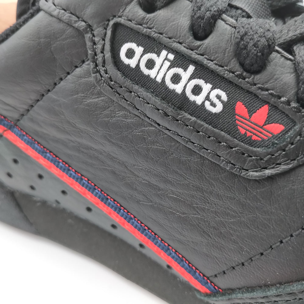 Adidas Continental 80 cuir noir et bandes rouges