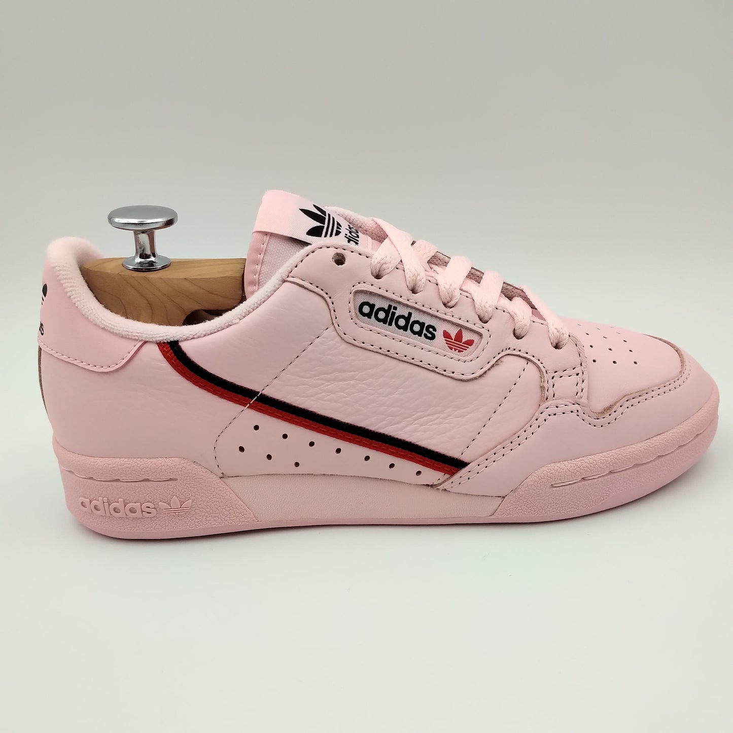Adidas Continental 80 cuir rose et bande noire et rouge